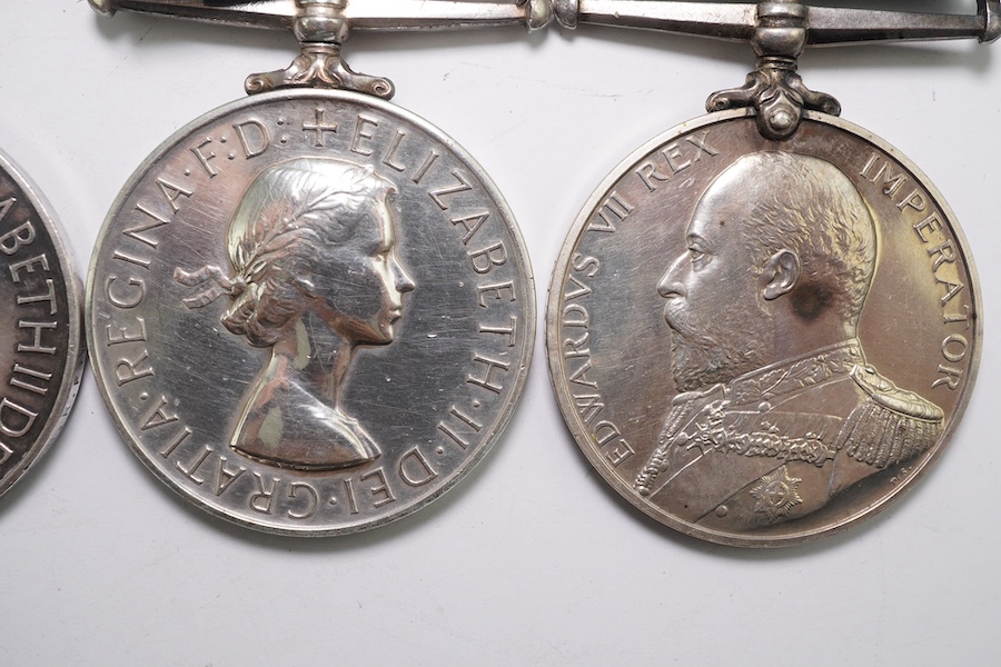 Four assorted Naval service medals; EVII RNRLSGC to 84333 G.Mitchell, Sea'n. 1CL. R.N.R.; GV RFRLSGC to J.99193 (Dev.B.15185) J.M.Dougall. A.B.R.F.R.; ERII RFRLSGC to SSSx.27156 J.W.Hopkins. Dev.B.17913.A.B. R.F.R; ERII